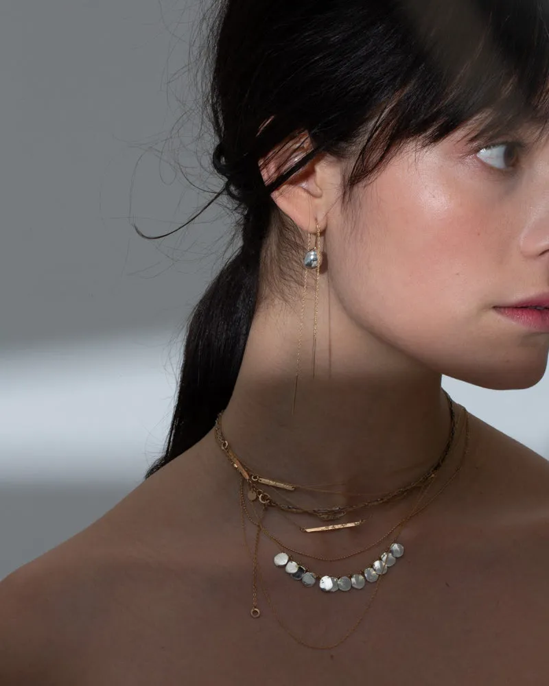 flat seed necklace